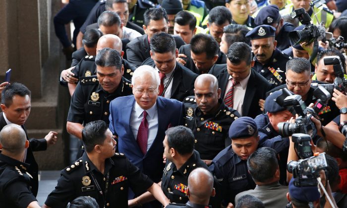 Former Malaysian prime minister Najib Razak arrives in court in Kuala Lumpur, Malaysia July 4, 2018. (Reuters/Lai Seng Sin)