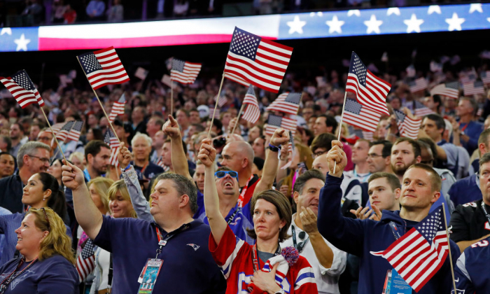 Fans wave American Flags during the National Anthem prior to Super Bowl 51 between the Atlanta Falcons and the New England Patriots at NRG Stadium in Houston, Texas, on Feb. 5, 2017. (Kevin C. Cox/Getty Images)