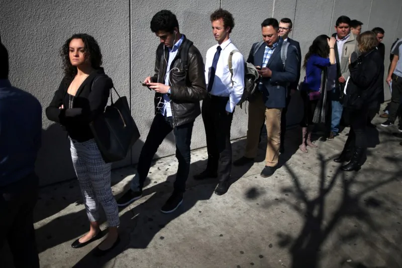 People line up to attend TechFair LA, a technology job fair, in Los Angeles on Jan. 26, 2017. (Lucy Nicholson/Reuters)