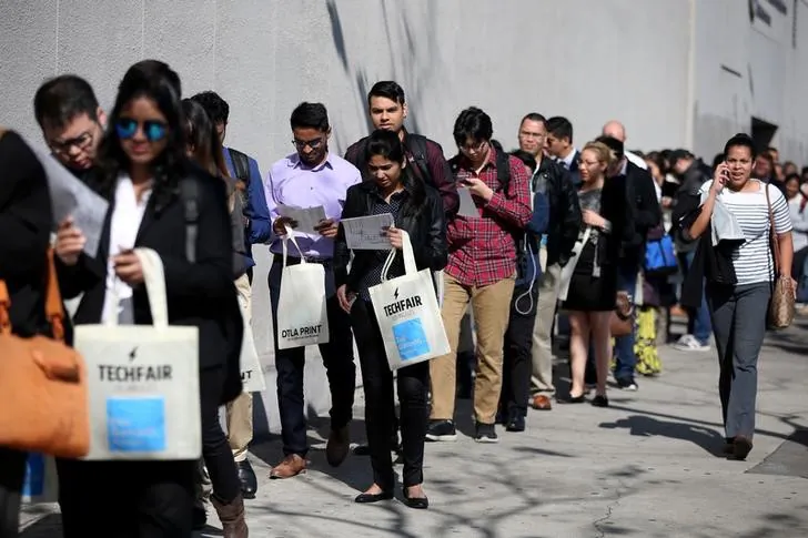 People wait in line to attend TechFair LA, a technology job fair, in Los Angeles, California, on Jan. 26, 2017. (REUTERS/Lucy Nicholson/File Photo)