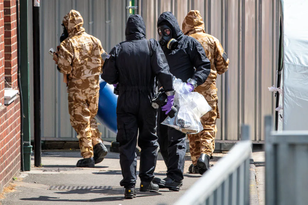 Emergency workers in protective suits search around John Baker House Sanctuary Supported Living after a major incident was declared when a man and woman were exposed to the Novichok nerve agent on July 6, 2018 in Salisbury, England. (Jack Taylor/Getty Images)