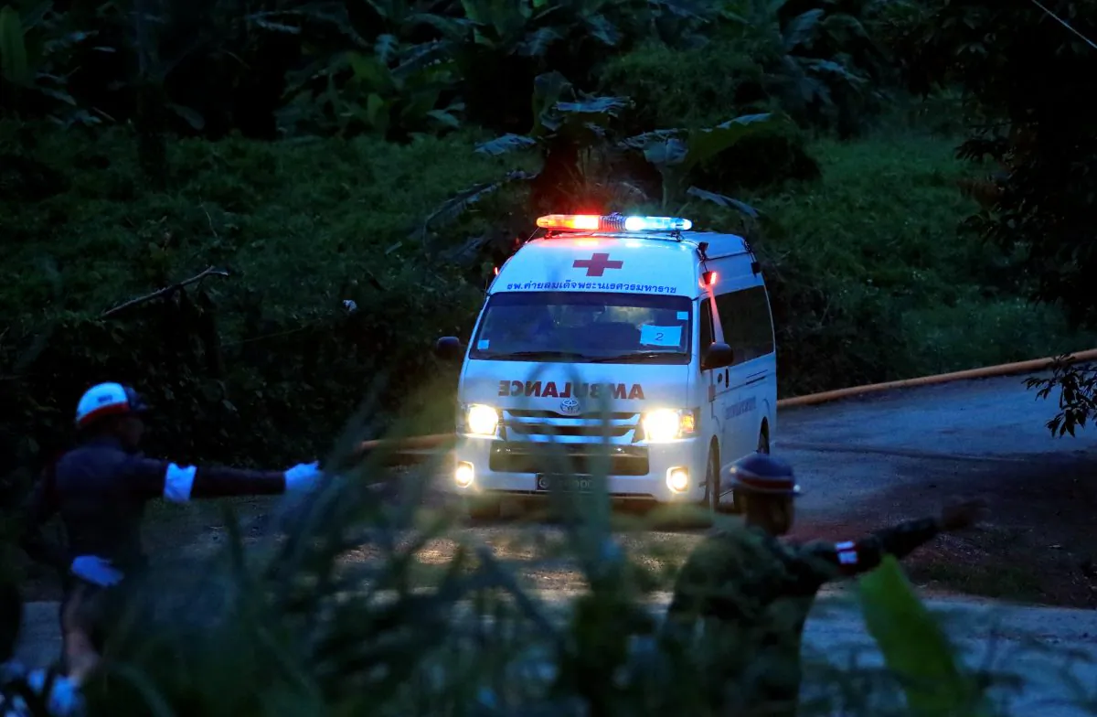 An ambulance leaves from Tham Luang cave complex in the northern province of Chiang Rai, Thailand, July 9, 2018. (Reuters/Soe Zeya Tun)