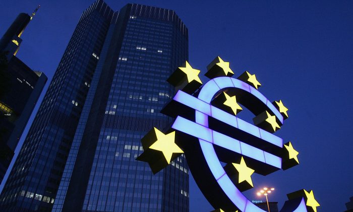A euro logo in front of the headquarters of the European Central Bank in Frankfurt, Germany in this file photo. (Ralph Orlowski/Getty Images)