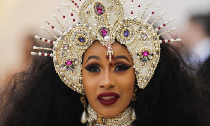 Rapper Cardi B arrives at the Metropolitan Museum of Art Costume Institute Gala to celebrate the opening of "Heavenly Bodies: Fashion and the Catholic Imagination" in the Manhattan borough of New York on May 7, 2018. (REUTERS/Carlo Allegri/File Photo)