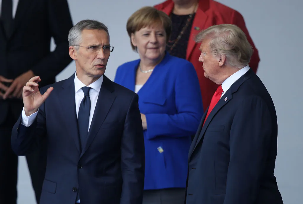 NATO Secretary General Jens Stoltenberg (L), German Chancellor Angela Merkel and President Donald Trump attend the opening ceremony at the 2018 NATO Summit at NATO headquarters on July 11, 2018 in Brussels, Belgium. (Sean Gallup/Getty Images)