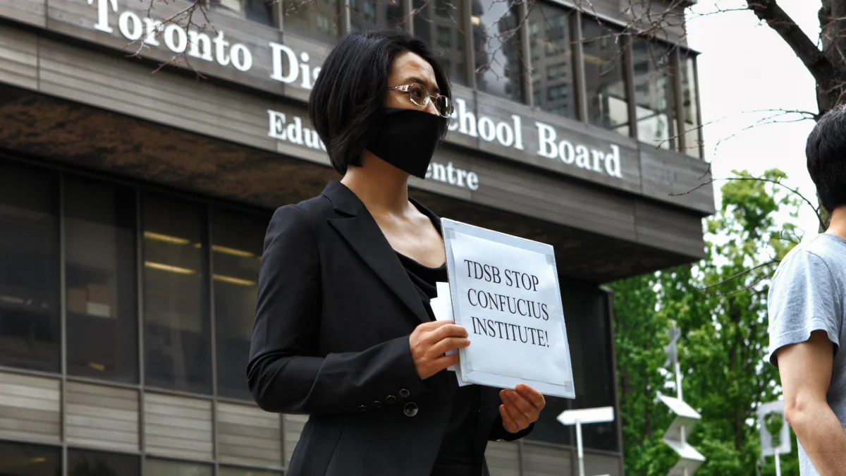Former Confucius Institute teacher, Sonia Zhao demonstrates against the Confucius Institutes outside the Toronto District School Board. (Mark Media)