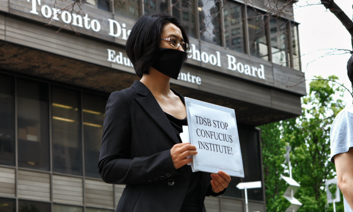 Former Confucius Institute teacher, Sonia Zhao demonstrates against the Confucius Institutes outside the Toronto District School Board. (Mark Media)