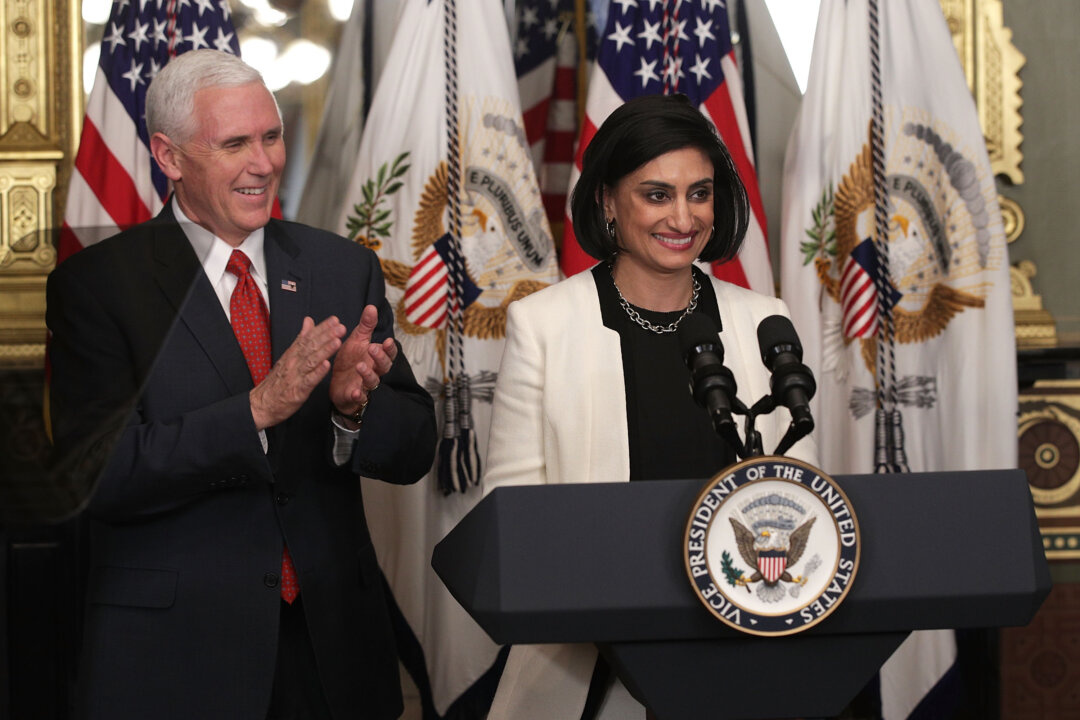 Seema Verma (R) speaks during a swearing-in ceremony, officiated by U.S. Vice President Mike Pence (L), in the Vice President's ceremonial office at Eisenhower Executive Building March 14, 2017 in Washington, DC. Verma is the administrator of the Centers for Medicare and Medicaid Services, which has proposed a rule change that would bar states from deducing union dues from Medicaid payments to home health care workers.  (Alex Wong/Getty Images)