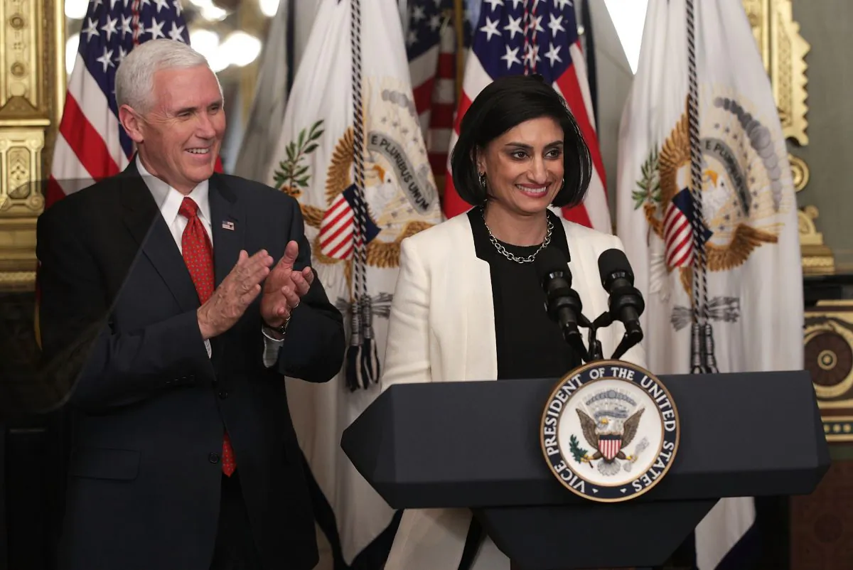 Seema Verma (R) speaks during a swearing-in ceremony, officiated by U.S. Vice President Mike Pence (L), in the Vice President's ceremonial office at Eisenhower Executive Building March 14, 2017 in Washington, DC. Verma is the administrator of the Centers for Medicare and Medicaid Services, which has proposed a rule change that would bar states from deducing union dues from Medicaid payments to home health care workers. (Alex Wong/Getty Images)