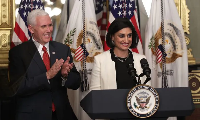 Seema Verma (R) speaks during a swearing-in ceremony, officiated by U.S. Vice President Mike Pence (L), in the Vice President's ceremonial office at Eisenhower Executive Building March 14, 2017 in Washington, DC. Verma is the administrator of the Centers for Medicare and Medicaid Services, which has proposed a rule change that would bar states from deducing union dues from Medicaid payments to home health care workers.  (Alex Wong/Getty Images)