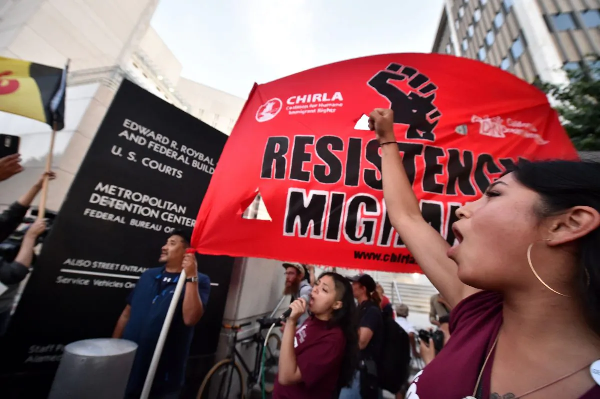 Protestors chant outside the Metropolitan Detention Center where ICE (U.S.Immigration and Customs Enforcement) detainees are held in downtown Los Angeles, California on June 14, 2018 (ROBYN BECK/AFP/Getty Images)