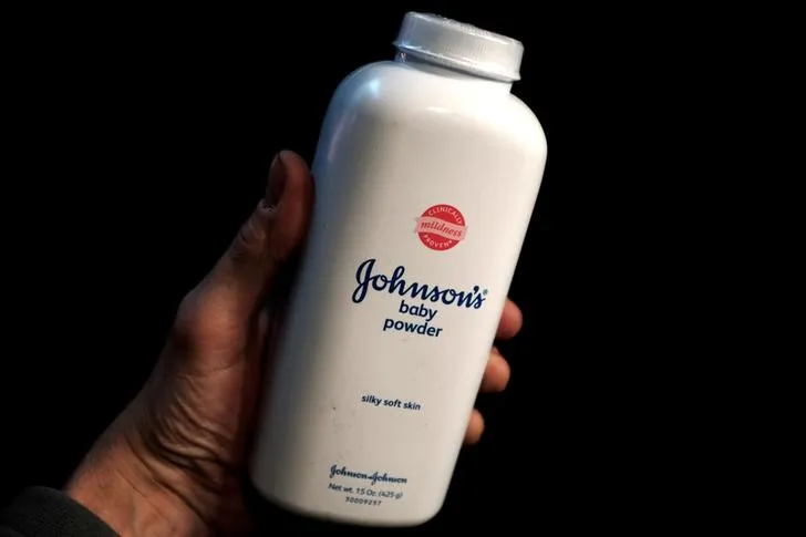 A bottle of Johnson and Johnson Baby Powder is seen in a photo illustration taken in New York on February 24, 2016.  (Reuters/Mike Segar)
