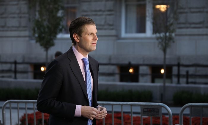 Eric Trump, son of Donald Trump, does a television interview before the ribbon cutting ceremony during the grand opening of the new Trump International Hotel in Washington on Oct. 26, 2016. (Chip Somodevilla/Getty Images)