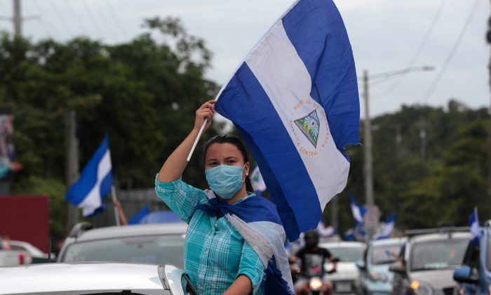 An anti-government protester takes part in a caravan of car and motorcycles to demand an end to violence in Ticuantepe, Nicaragua July 15, 2018.(Reuters/Oswaldo Rivas)