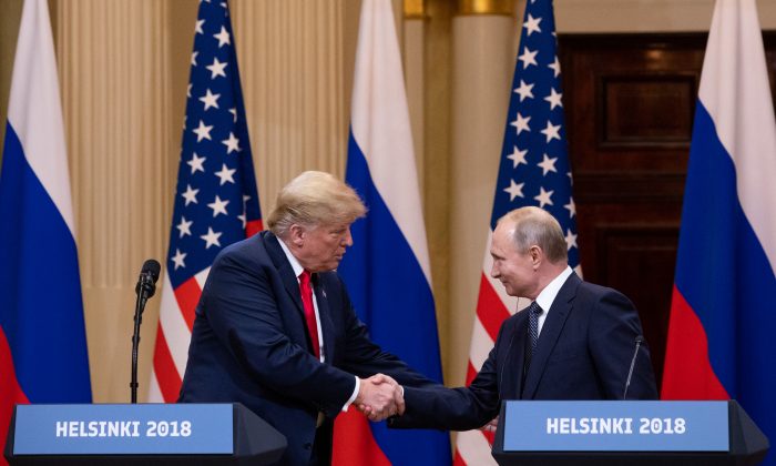 President Donald Trump and Russian President Vladimir Putin hold a joint press conference at the Presidential Palace in Helsinki, Finland, on July 16, 2018. (Samira Bouaou/The Epoch Times)