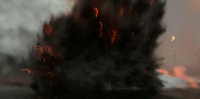A basketball-sized lava bomb punctured the vessel's roof, and explosion debris littered the floor of the boat, said officials. (Hawaii County Civil Defense Agency)