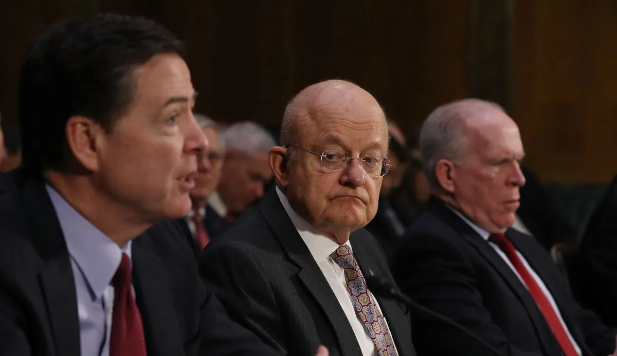 Then-FBI Director James Comey, then-Director of National Intelligence James Clapper, and then-Central Intelligence Agency Director John Brennan (L-R) testify before the Senate Intelligence Committee in the Dirksen Senate Office Building on Capitol Hill in Washington, D.C., on Jan. 10, 2017. (Joe Raedle/Getty Images)