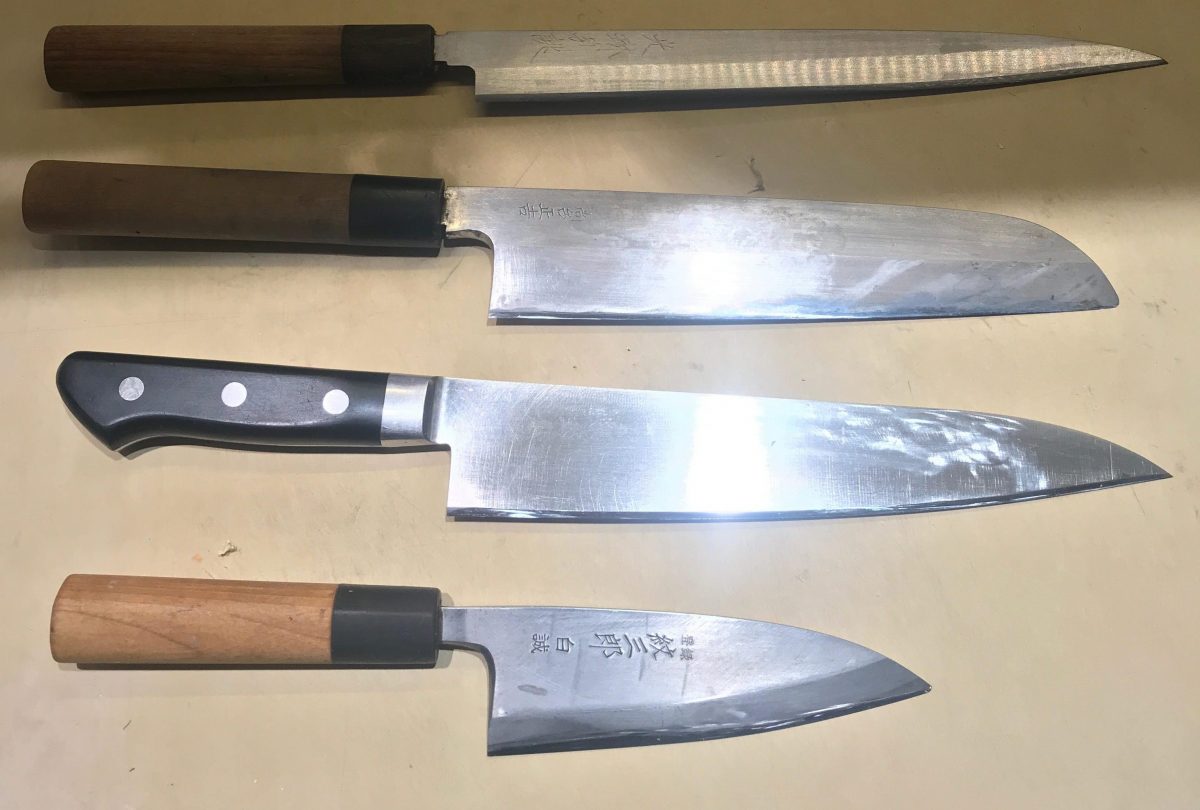 Swikard's knives: (top to bottom) Yanagi (sushi slicing knife), Usuba (vegetable peeling knife), chef's knife, and Deba (fish butchery). (Travis Swikard)