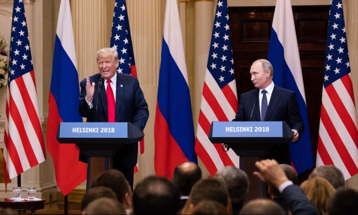 President Donald Trump and Russian President Vladimir Putin hold a joint press conference at the Presidential Palace in Helsinki, Finland, on July 16, 2018. (Samira Bouaou/The Epoch Times)