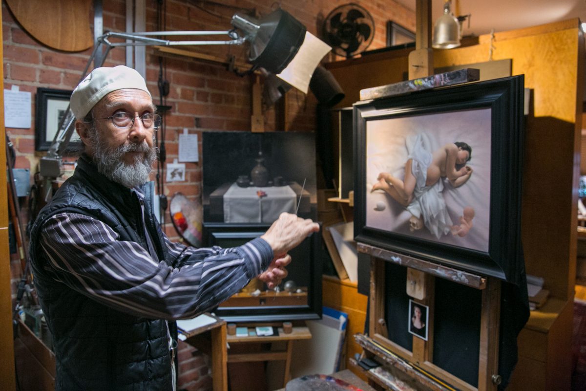 Painter and draftsman Carlos Madrid talks about his life and work in his studio in New York on July 3, 2018. (Milene Fernandez/The Epoch Times)