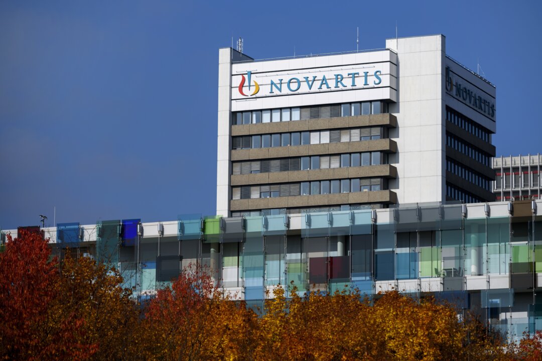 A sign of Novartis on the top of a building at the company's campus in Basel, on Oct. 27, 2015. (Fabrice Coffrini/AFP/Getty Images)