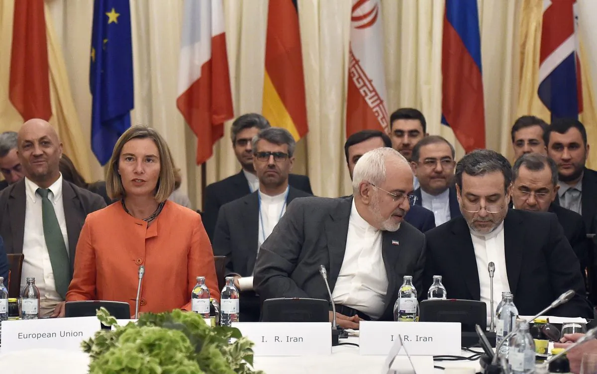 European Union High Representative for Foreign Affairs Federica Mogherini (L), Iranian Minister of Foreign Affairs Mohammad Javad Zarif (C), and political deputy at the Ministry of Foreign Affairs of Iran Abbas Araghchi at a meeting on the Iran nuclear deal in Vienna on July 6, 2018. (Hans Punz/AFP/Getty Images)