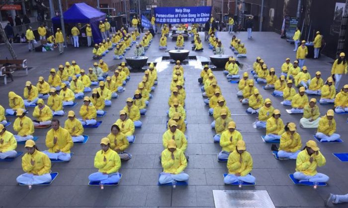 Sydney Falun Gong practitioners commemorate their brothers and sisters who have suffered or lost their lives after what is now 19 years of brutal persecution by the Chinese Communist Party on July 20, 2018. (Henry Lam)