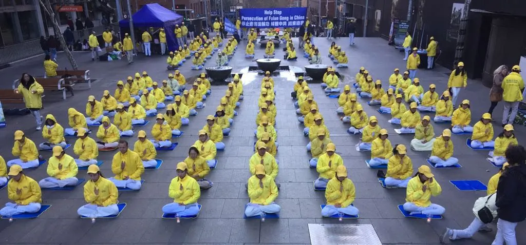 Sydney Falun Gong practitioners commemorate their brothers and sisters who have suffered or lost their lives after what is now 19 years of brutal persecution by the Chinese Communist Party on July 20, 2018. (Henry Lam)