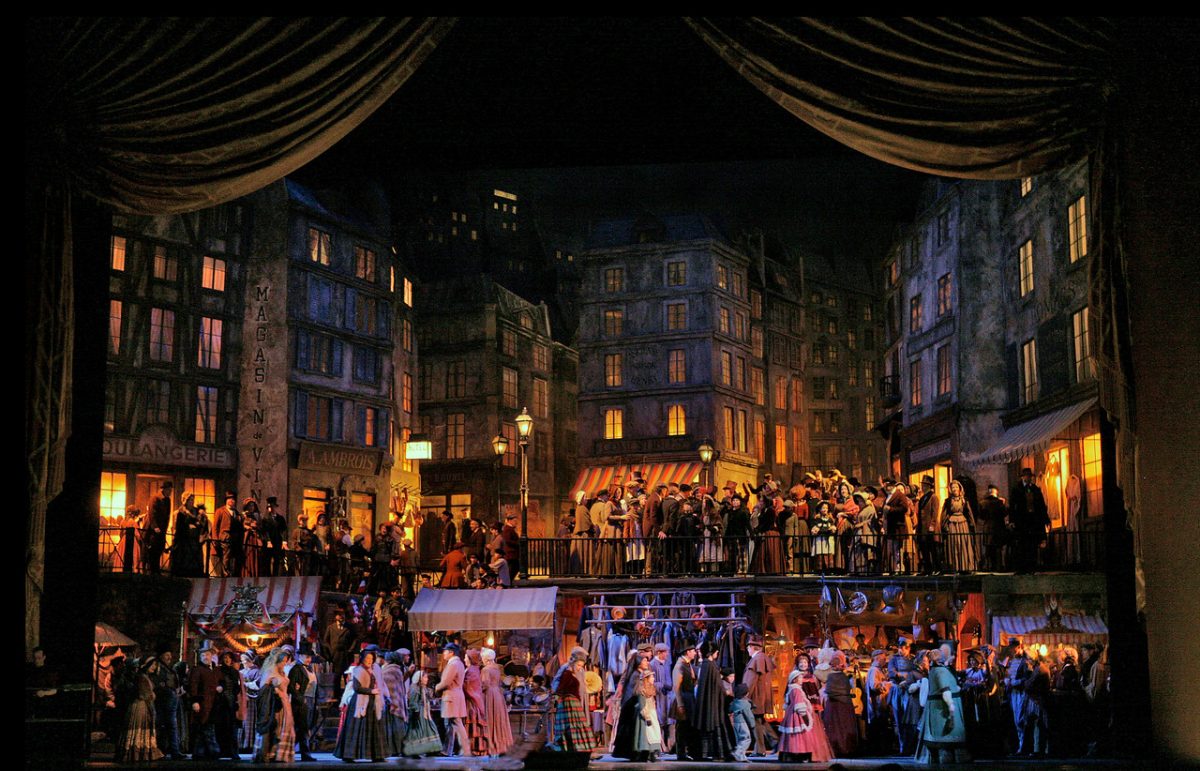 A scene from Act 2 of Giacomo Puccini’s “La Bohème” playing in the fall of 2018. The production will retain Franco Zeffirelli’s exquisite set.  (Ken Howard/Metropolitan Opera)