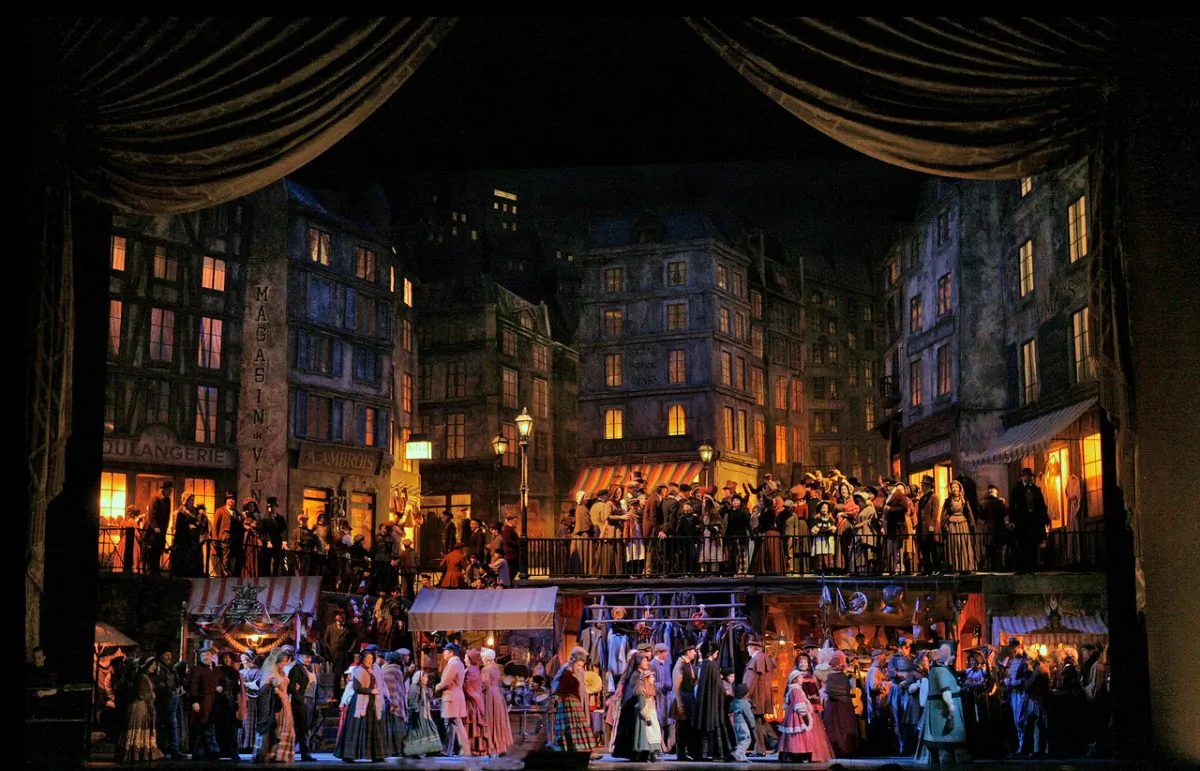 A scene from Act 2 of Giacomo Puccini’s “La Bohème” playing in the fall of 2018. The production will retain Franco Zeffirelli’s exquisite set.  (Ken Howard/Metropolitan Opera)