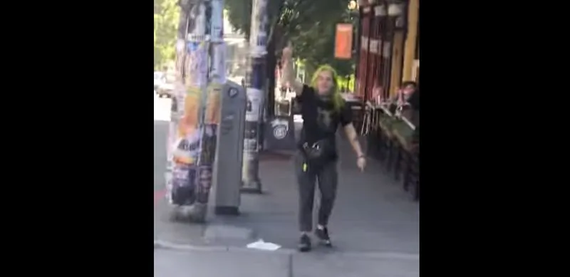 A teen visiting Seattle says he was harassed by a man for wearing a 'MAGA' hat. (Ashton Hess/YouTube)