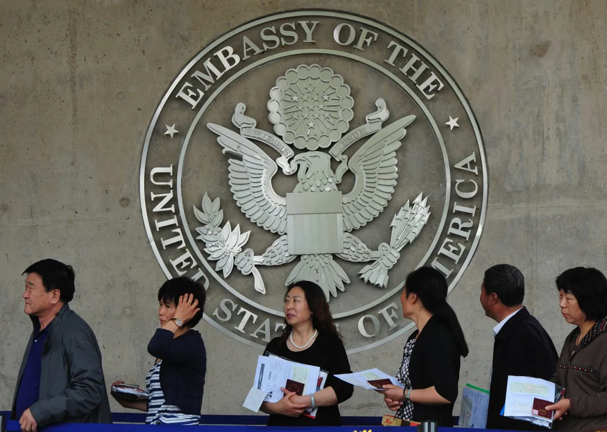Chinese citizens wait to submit their visa applications at the U.S. Embassy in Beijing on May 2, 2012. (Mark Ralston/AFP/Getty Images)
