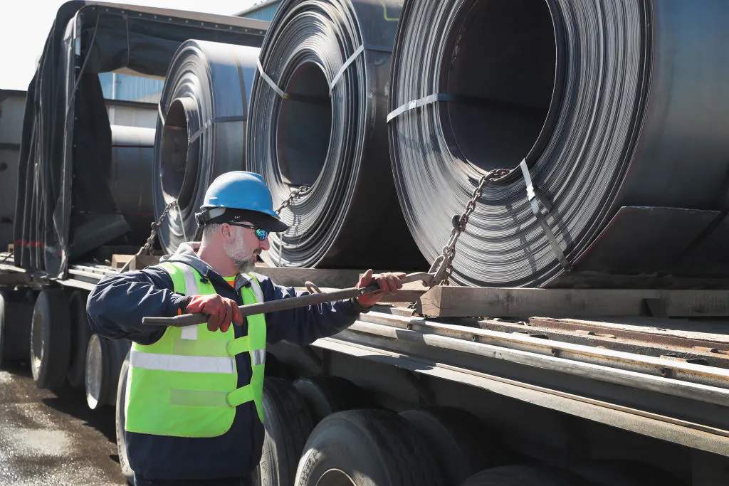 Steel is loaded onto a truck for shipping at the NLMK Indiana steel mill in Portage, Indiana, on March 15. The Trump administration imposed a 25 percent tariff on imported steel in March. (Scott Olson/Getty Images)