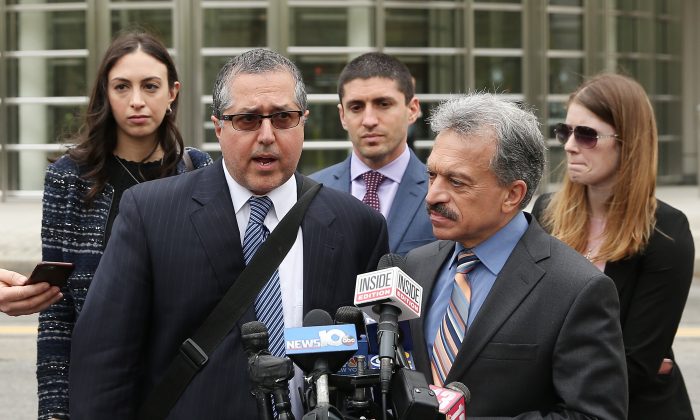 Legal Council representing Keith Raniere and the group NXIVM Mark Agnifilo and Paul DerOhannesian speak to the media outside the United States Eastern District Court after a bail hearing for actress Allison Mack and NXIVM founder Keith Raniere in relation to the sex trafficking charges in the Brooklyn borough of New York City on May 4, 2018. (Jemal Countess/Getty Images)