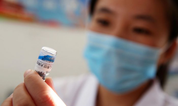 A nurse prepares a vaccination shot against rabies at the Disease Control and Prevention Center in Huaibei in easern China's Anhui Province on July 24, 2018. (AFP/Getty Images)