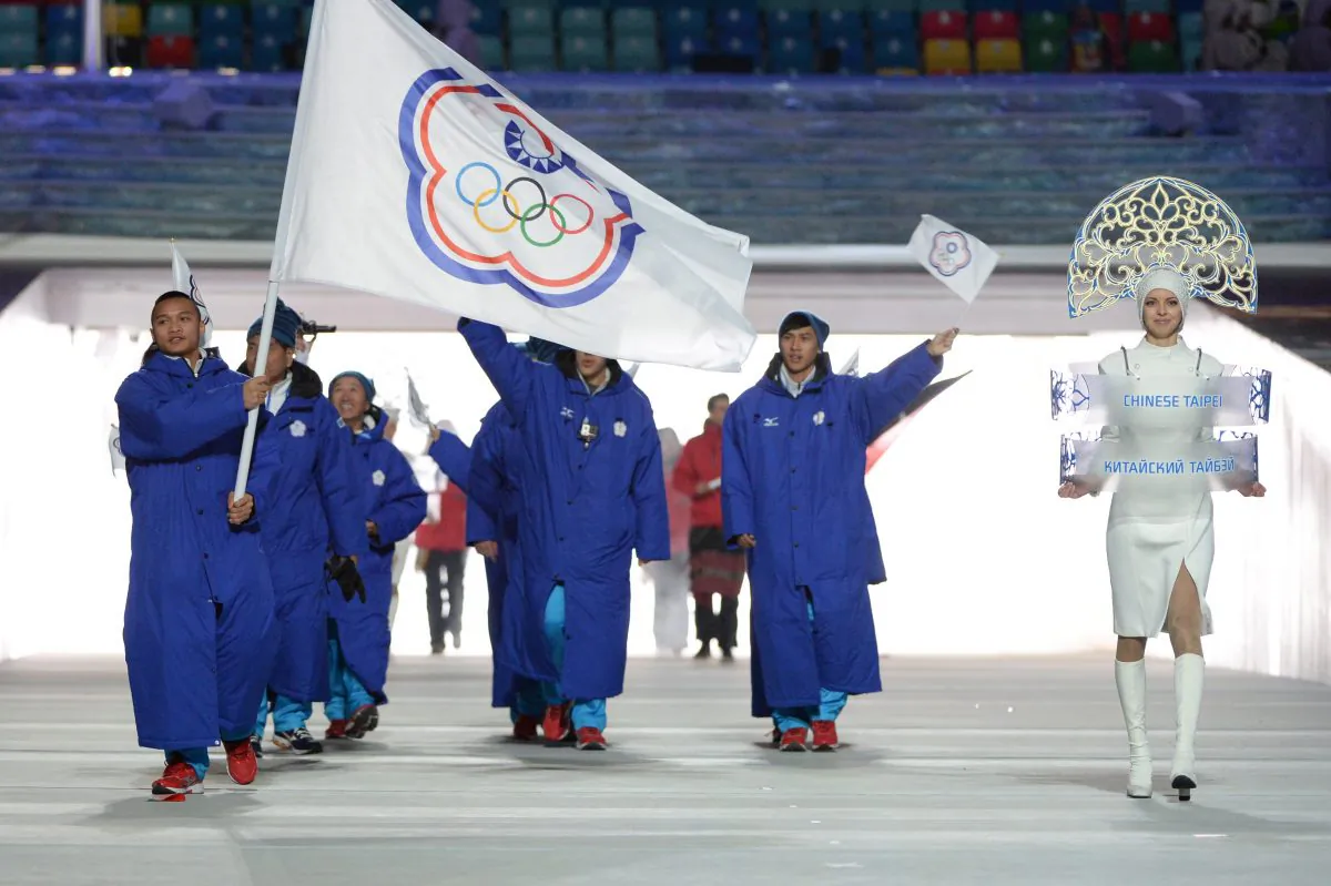 Taiwan's flag bearer, speed skater Sung Ching-Yang, leads his national delegation during the opening ceremony of the Sochi Winter Olympics at the Fisht Olympic Stadium in Sochi, Russia, on Feb. 7, 2014. (Andrej Isakovic/AFP/Getty Images)