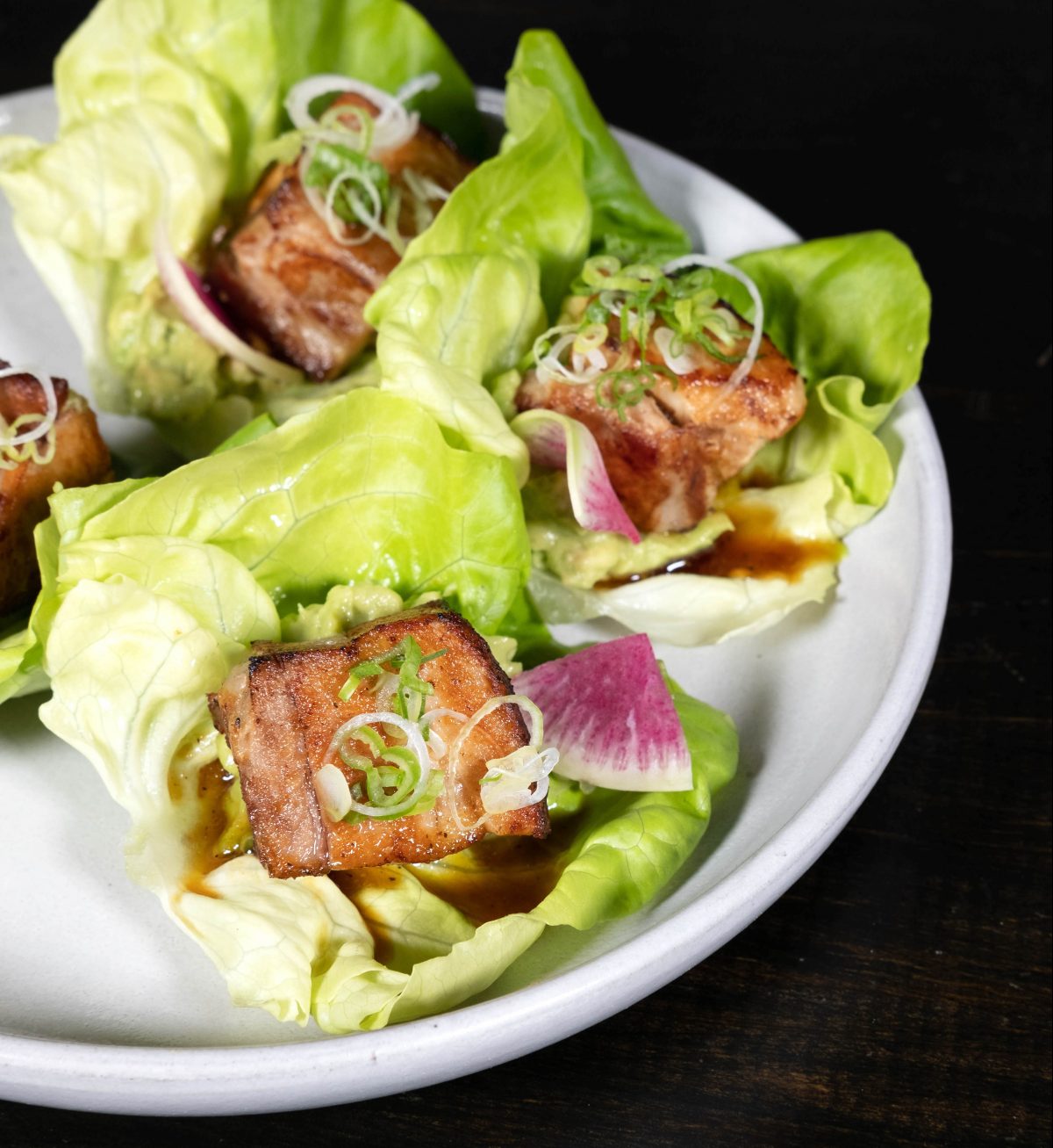 Traditional ssam, with pork belly and avocado wrapped in butter lettuce. 