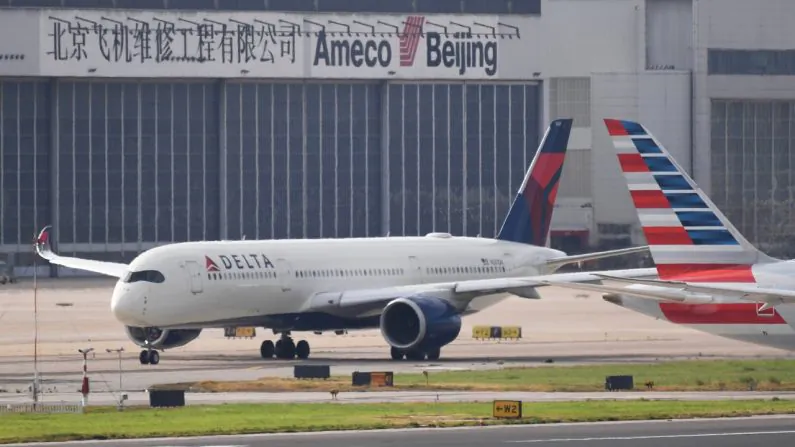 A Delta Airlines Airbus A350 aircraft waits to take off at Beijing airport on July 25, 2018. (Greg Baker/AFP/Getty Images)