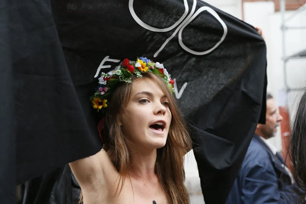 Activist Oksana Shachko of the Ukrainian women's movement Femen protesting against anti-women's politic near the official Femen Center that opened in Paris, on Sep. 18, 2012. (KenzoTribouillard/AFP/Getty Images)