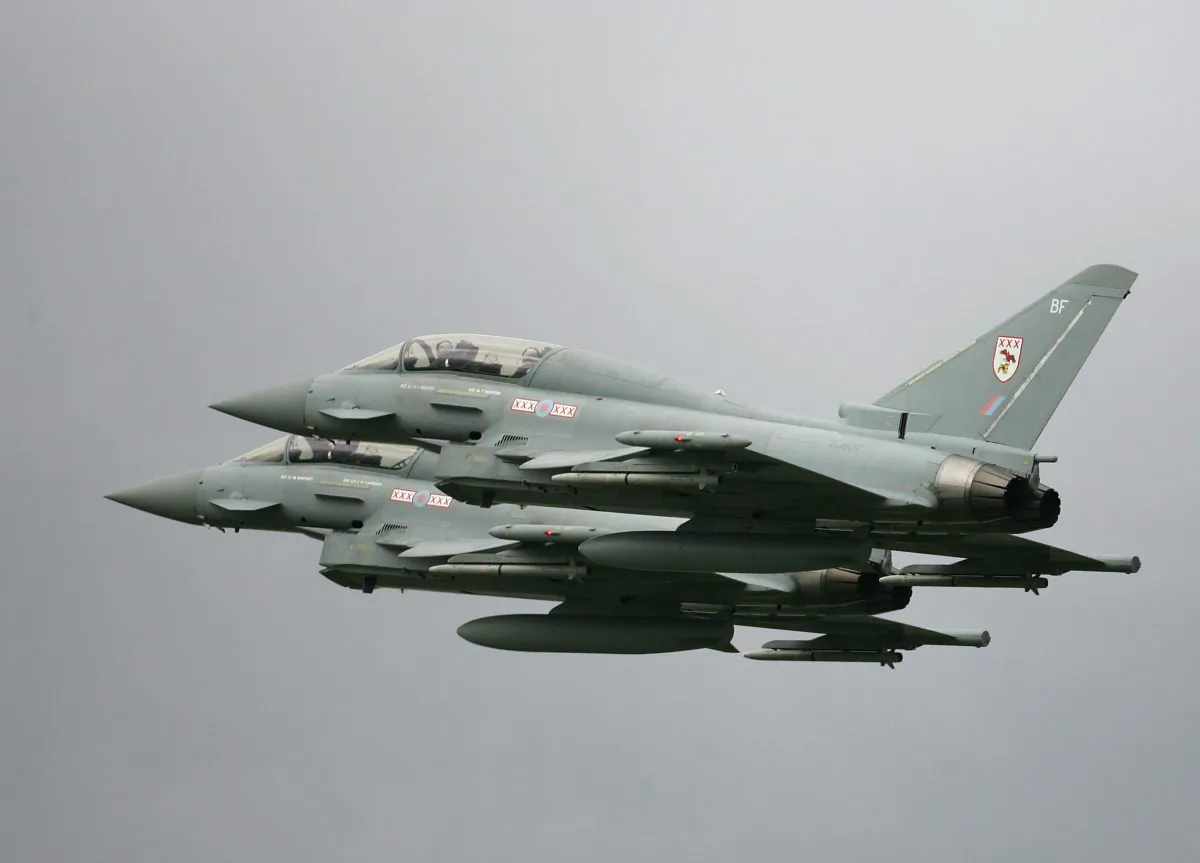 Two low flying Eurofighter Typhoons take off at RAF Coningsby in Lincolnshire, England in this file photo. (Christopher Furlong/Getty Images)