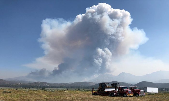 Smoke from the Cranston Fire is shown from east of Lake Hemet in Riverside County, California, U.S., July 26, 2018.  (USFS/Handout via Reuters)