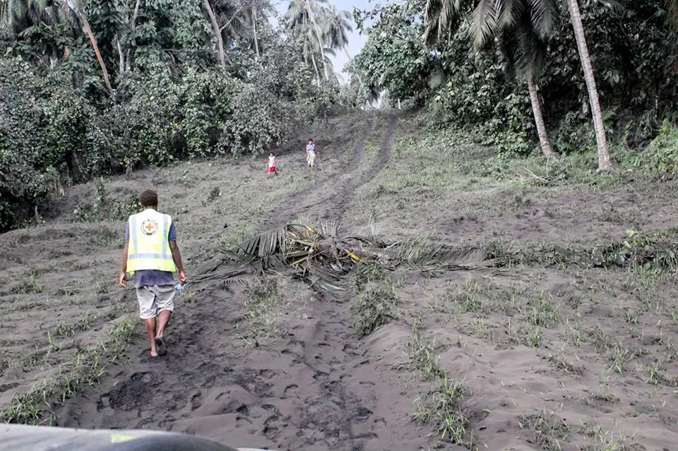The landscape in Sakao has been transformed by the latest ash fall, plantations of coconuts, gardens, roads, water sources on the creeks were covered by thick ashes. Water supply and access is already a challenge. Nicholson Naki/Vanuatu Red Cross Society)