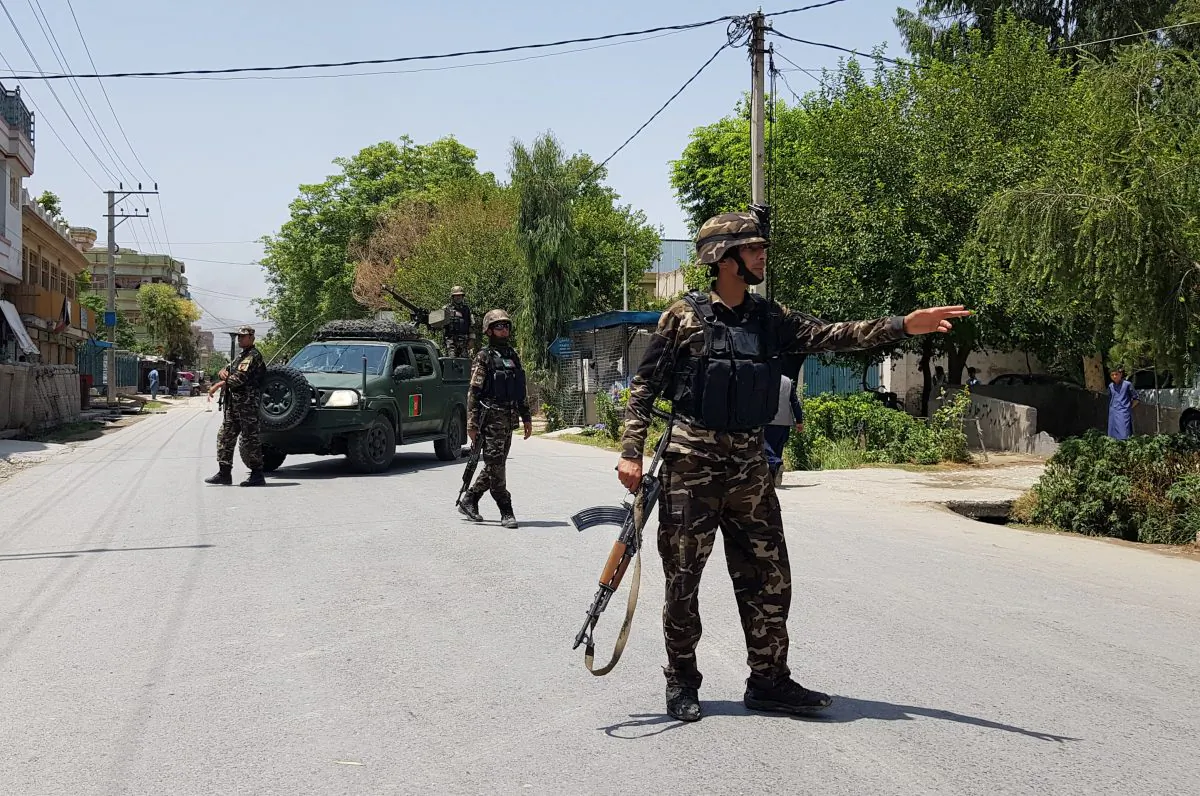 Afghan security forces arrive at an area where explosions and gunshots were heard, in Jalalabad city, Afghanistan, on July 28, 2018. (REUTERS/Parwiz)