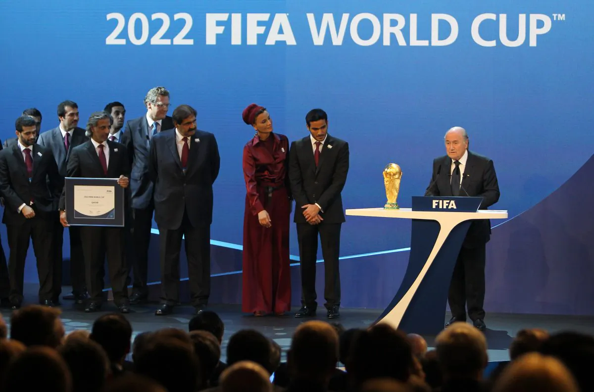 FIFA president Joseph Blatter (R) after Qatar was chosen to host the 2022 World Cup at the FIFA headquarters in Zurich on Dec. 2, 2010. (Karim Jaafar/AFP/Getty Images)