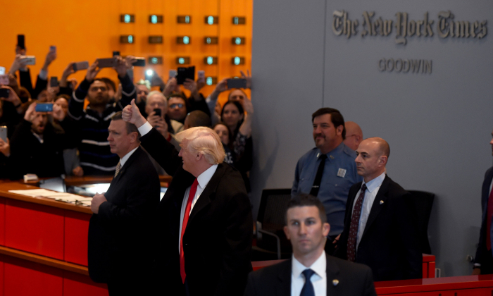 FILE PHOTO: President-elect  Donald Trump  waves to the crowd after leaving a meeting at the New York Times on November 22, 2016 in New York. (Timothy Clary/AFP/Getty Images)