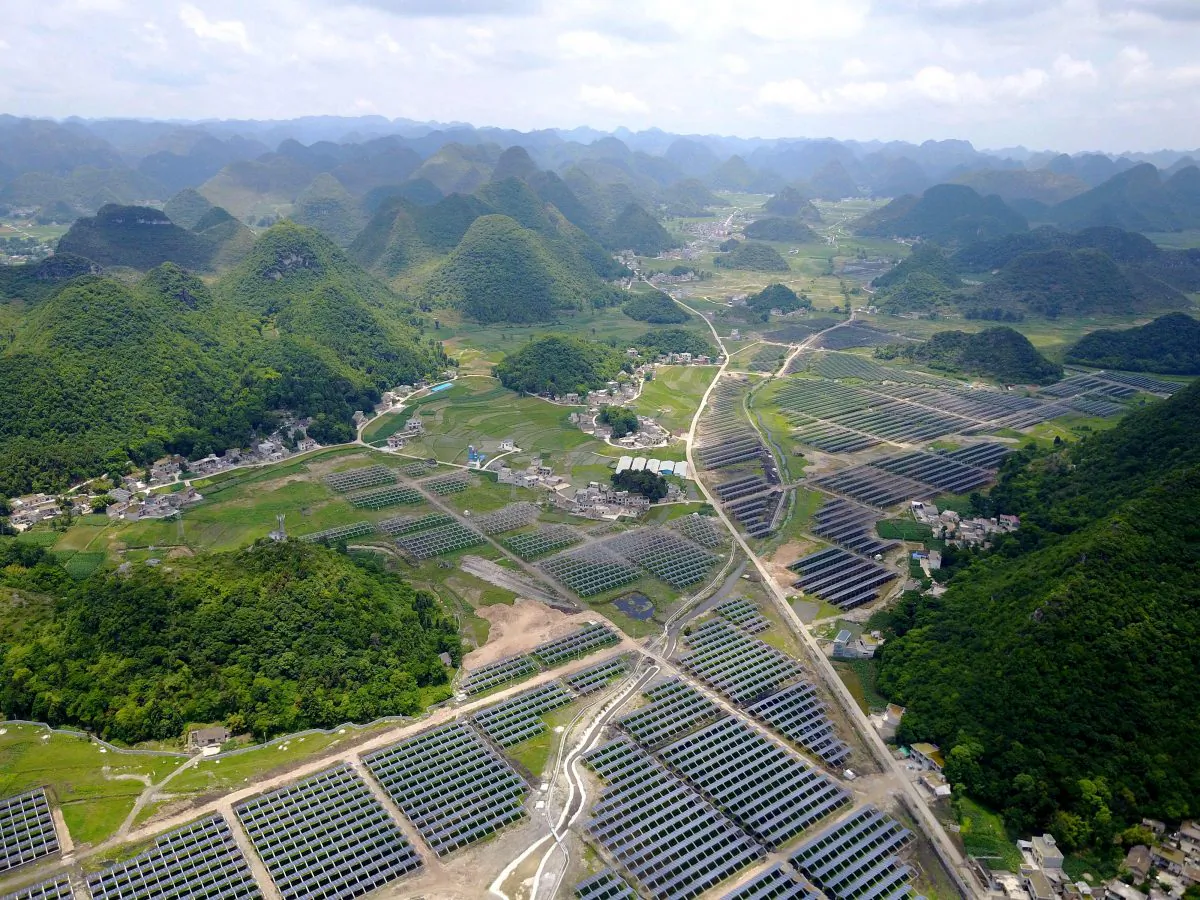 Greenhouses built with solar panels on their roofs in Yang Fang Village in Anlong County, Guizhou Province, China on June 10, 2017. (STR/AFP/Getty Images)