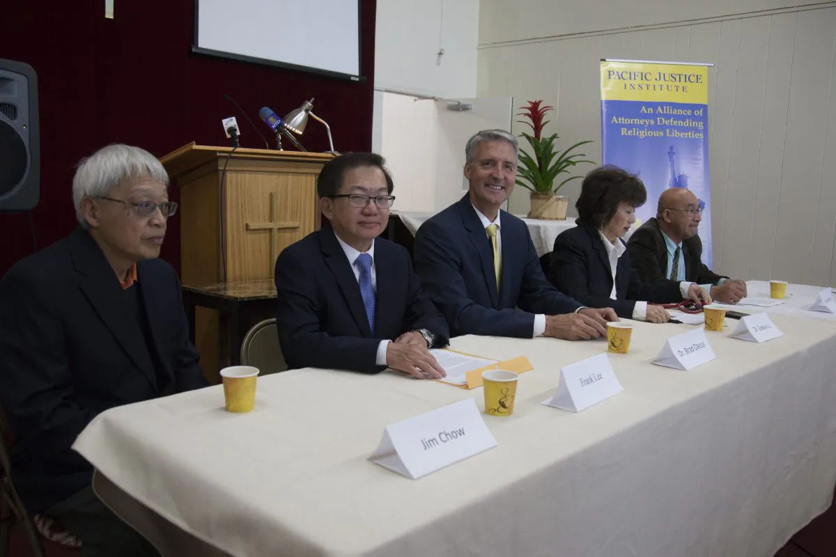 Frank Lee (2nd L) and Dr. Brad Dacus (3rd L) during a PJI event in Northern California (Lear Zhou/The Epoch Times)