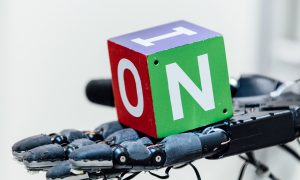 Robot Hand Learns Real World Moves in Virtual Training