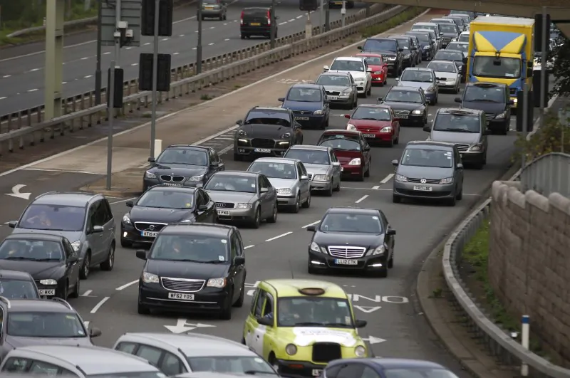 A file photograph shows a traffic jam as cars head towards the approach tunnel of Heathrow Airport, west London, on Nov. 26, 2015. (Reuters/Peter Nicholls/files)