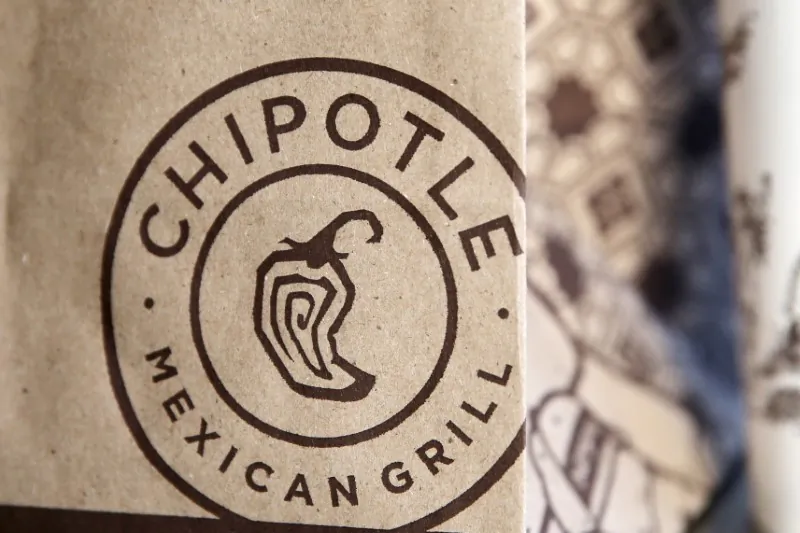 A logo of Chipotle Mexican Grill is seen on one of their bags in Manhattan, New York, on Nov. 23, 2015. (Andrew Kelly/Retuers)